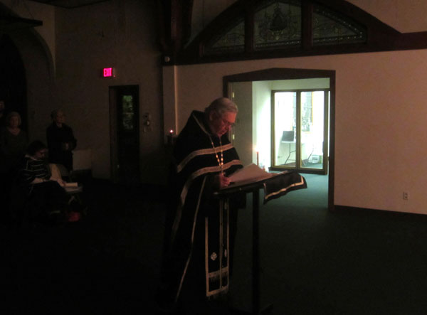 Father Jannakos reads the Canon of St. Andrew of Crete.