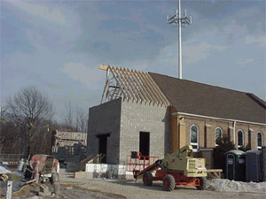 Side view showing new roof and narthex.